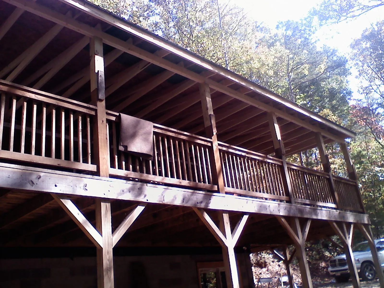 Timber framing under a new elevated porch and deck — Roof Leak Repair in Hersey by Roofing Brothers